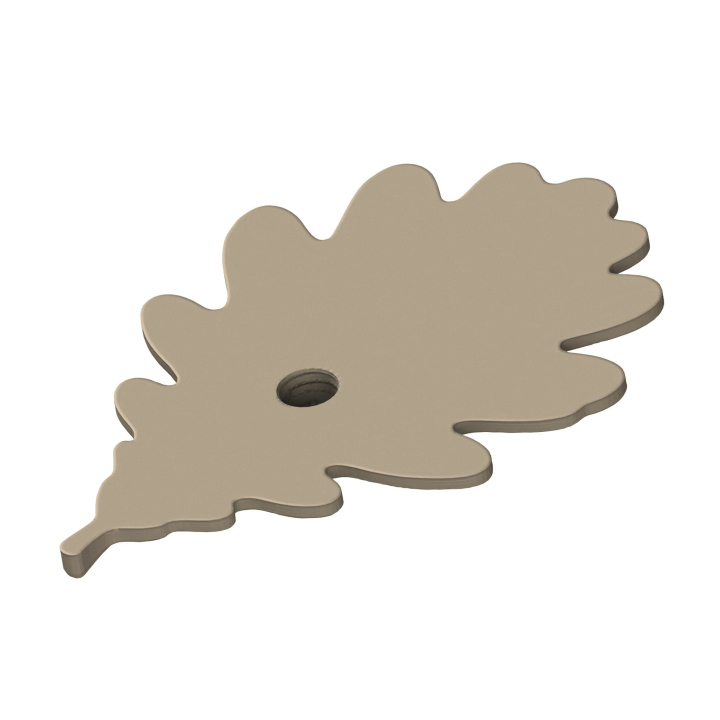 Ukrycie zapachu do treningóe nosework - atrapa dębowego liścia z gniazdem na puszki zapachowe