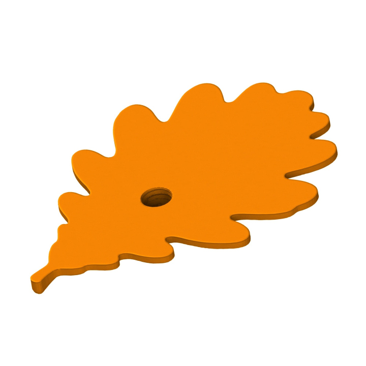 Ukrycie zapachu do treningóe nosework - atrapa dębowego liścia z gniazdem na puszki zapachowe