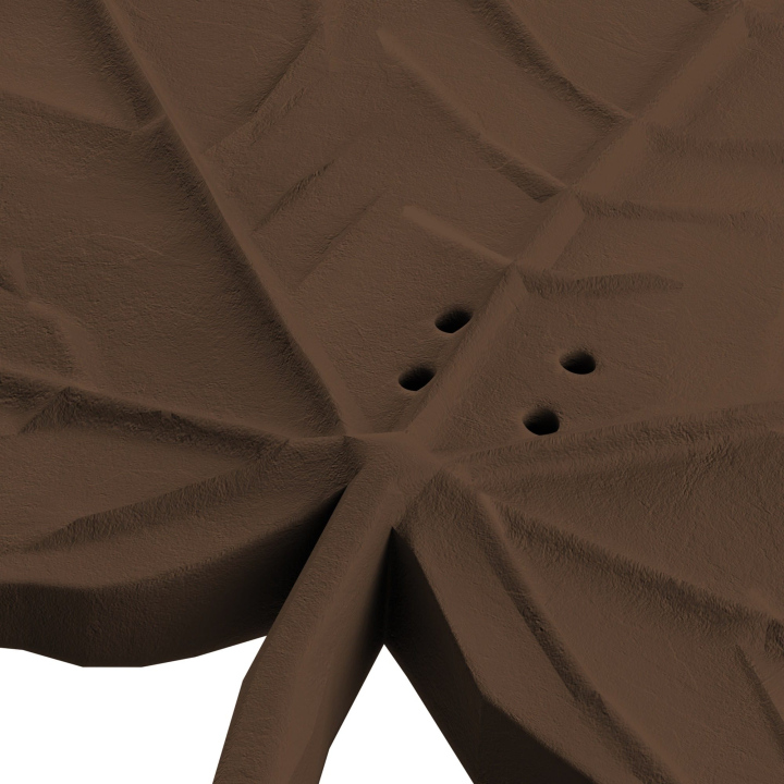 Otwory w atrapie liścia klonu