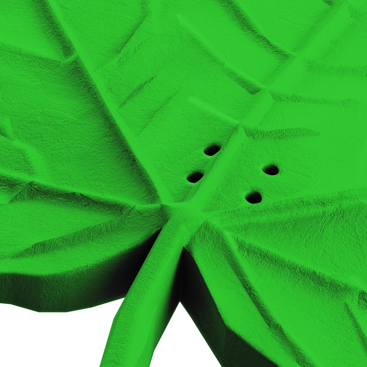 Otwory w atrapie liścia klonu