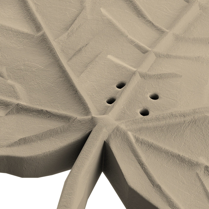 Otwory w atrapie liścia klonu